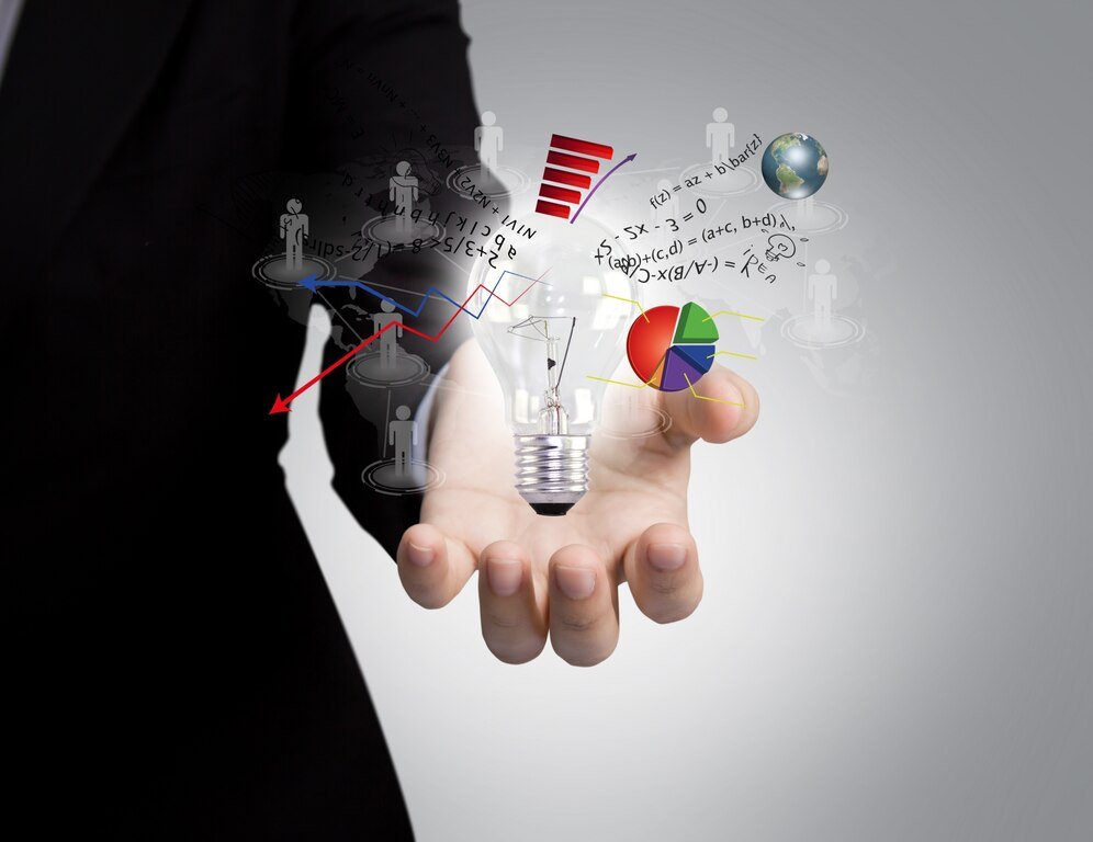 executive-with-light-bulb-surrounded-by-icons_1232-162